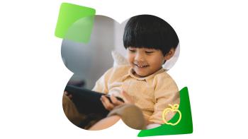 Kid playing on an ipad
